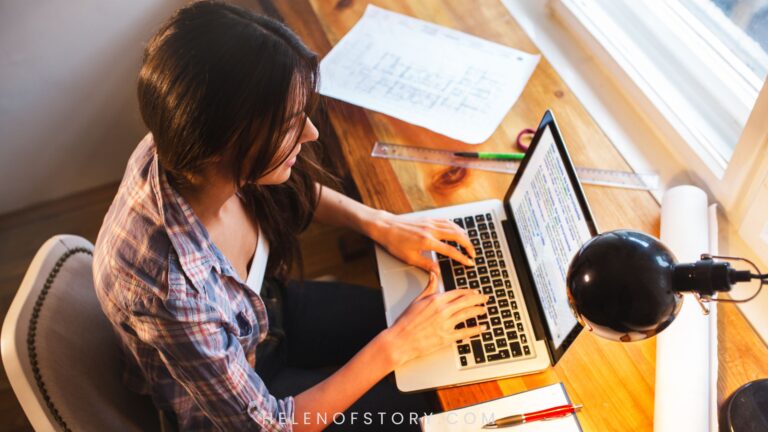 Shows a blogger typing on a laptop.